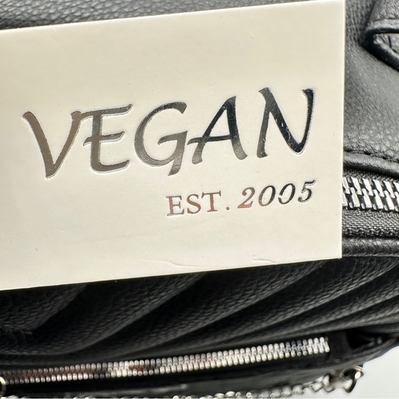 Vegan Quilted Black Backpack – Silver Chain Accent | 100% Vegan Friendly

⸻